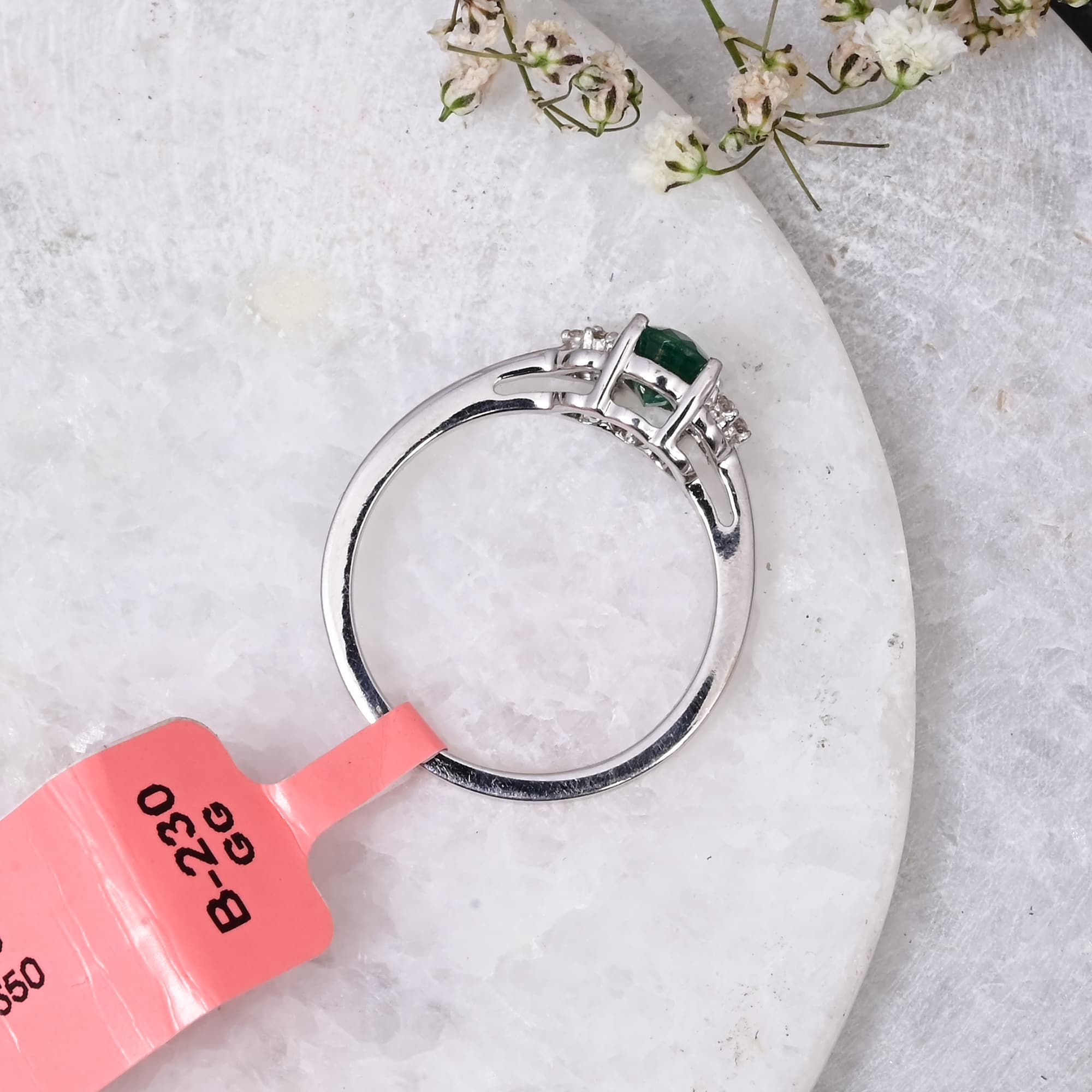 Emerald Whisper Solitaire Ring