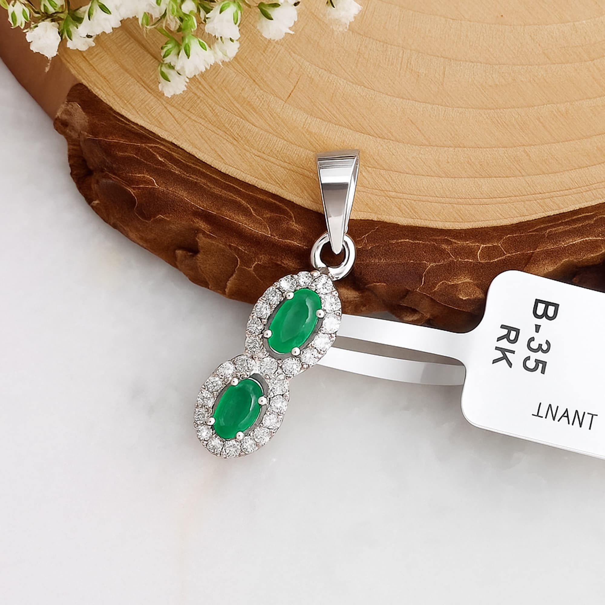 Emerald Diamond Infinity Halo Pendant