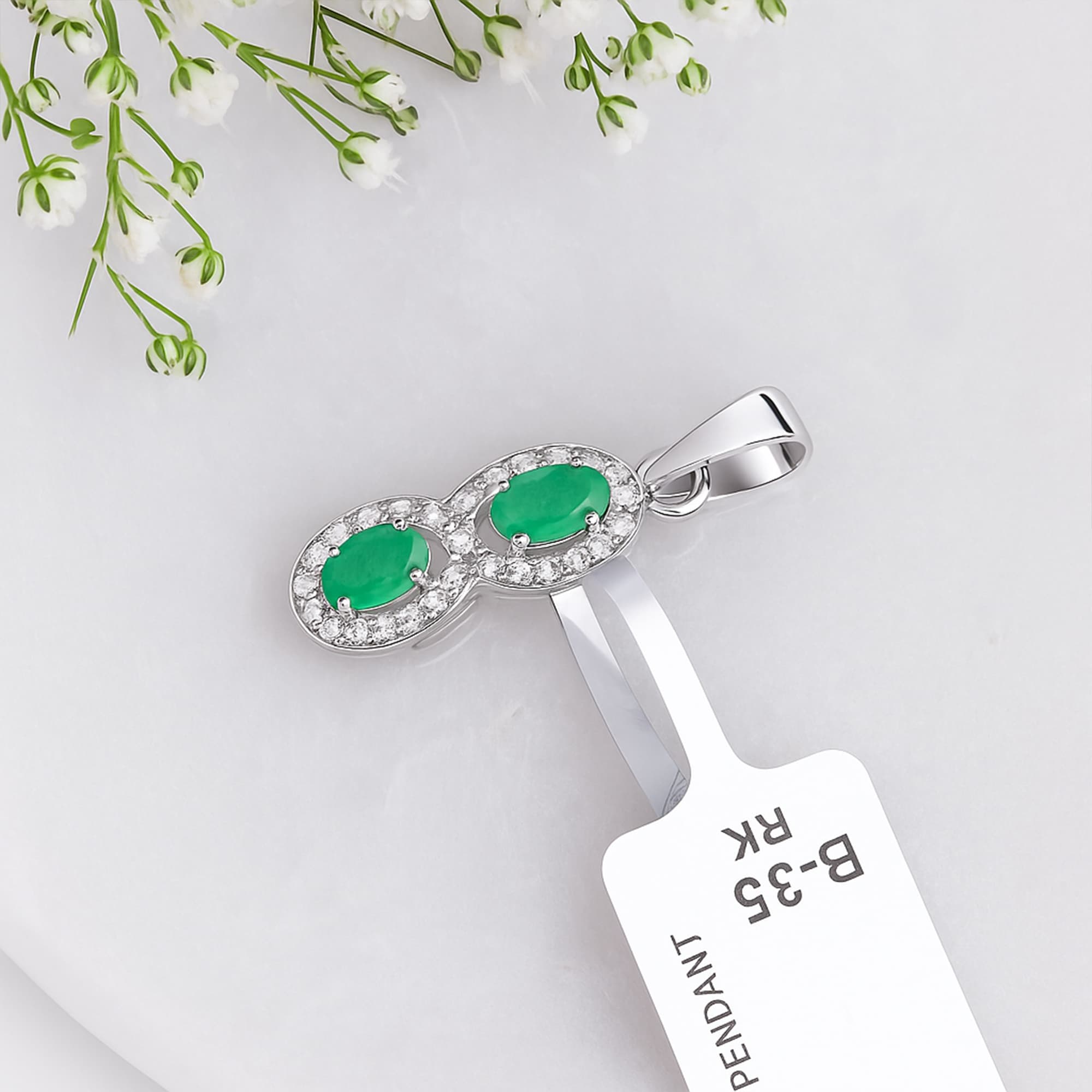 Emerald Diamond Infinity Halo Pendant