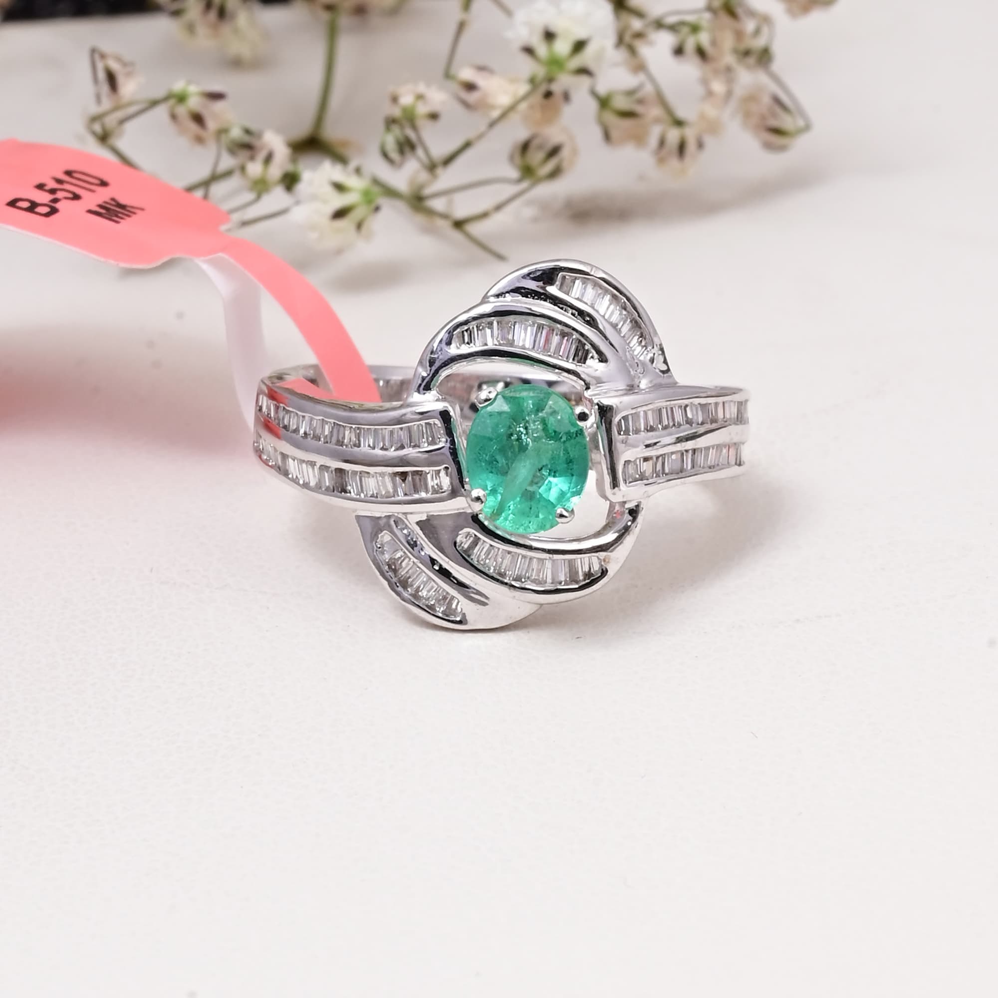 Emerald Infinity Twist Ring