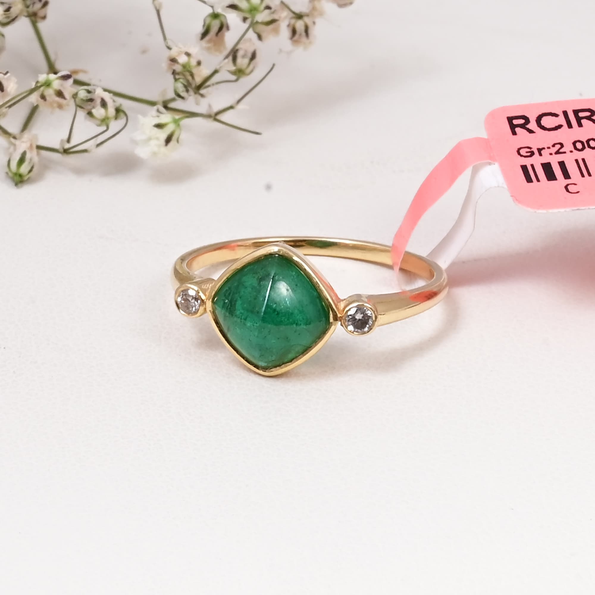 Emerald Whisper Solitaire Ring